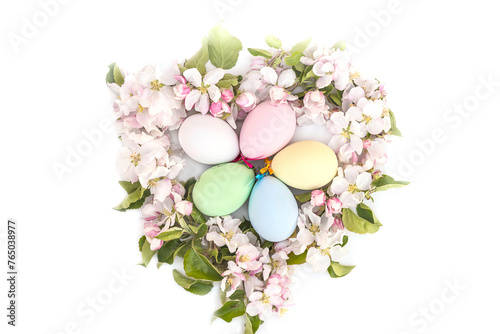 Easter holiday greeting card; easter eggs in apples flowers heart on white background