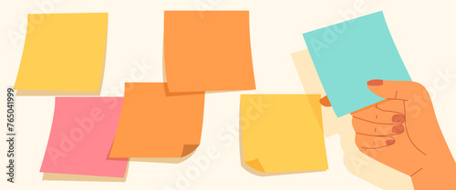 Blank colorful sticky notes on the wall and hand holding different one. Concept of remind, idea, note , editable sticky paper, brainstorming, office, background, template .Flat vector illustration
