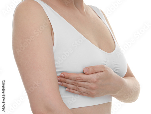Mammology. Young woman doing breast self-examination on white background, closeup