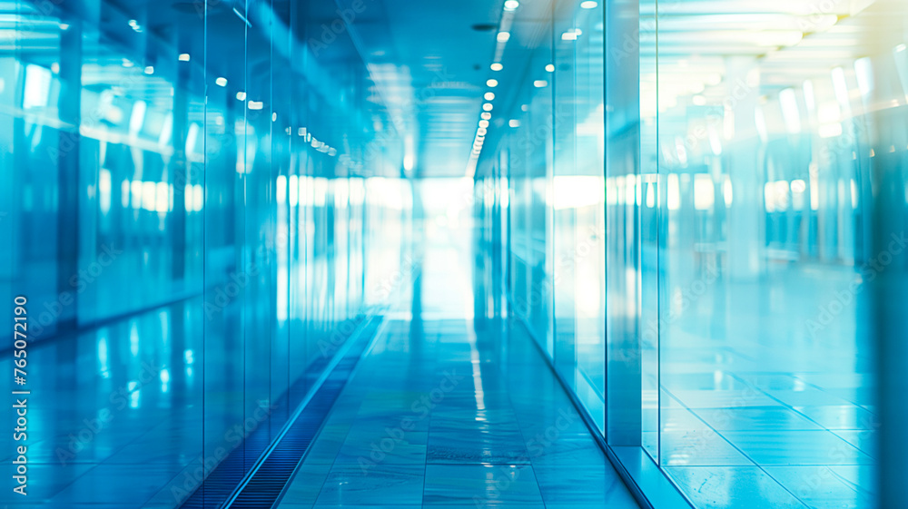 Blurred blue glass corridor, hallway in a modern office building