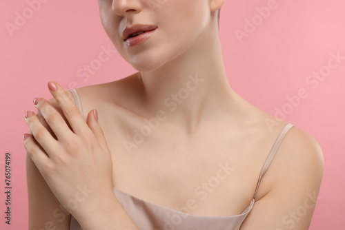 Beauty concept. Woman on pink background  closeup