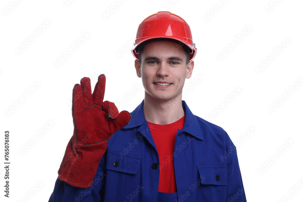 Young man wearing safety equipment and showing ok gesture on white background Young man wearing safety equipment and showing ok gesture on white background