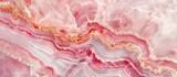 A detailed view of a textured pink and gold marble pattern against a clean white backdrop