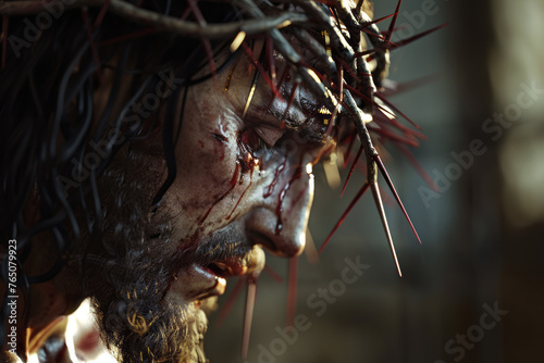 Portrait of suffering Jesus with crown of thorns on his head with blood close up with space for text or inscriptions, religious motif
