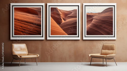 A triptych of narrow vertical frames on a sandstone wall, evenly spaced, exhibiting fine art photography with an emphasis on desert landscapes.