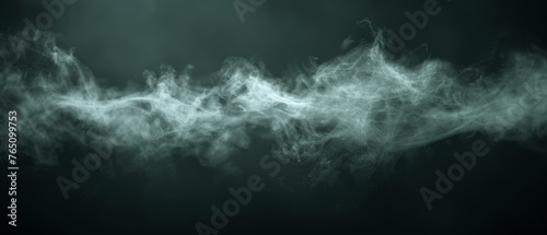  A grayscale picture of smoky waves against a dark backdrop