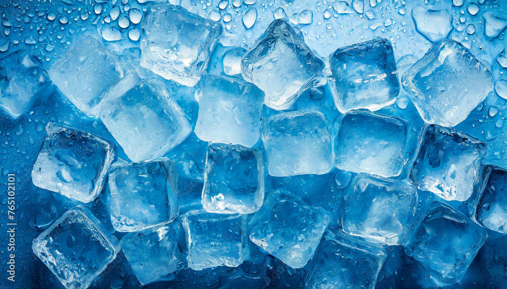 Ice cubes with water drops scattered on a blue background, top view. Summer freshness concept