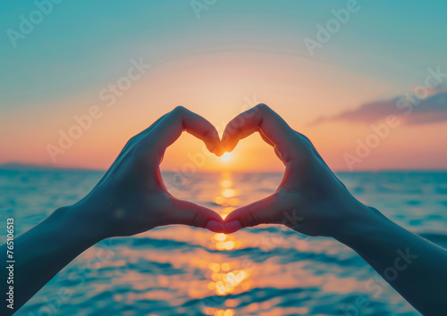 Love Symbol Created by Arms Against Colorful Sunrise