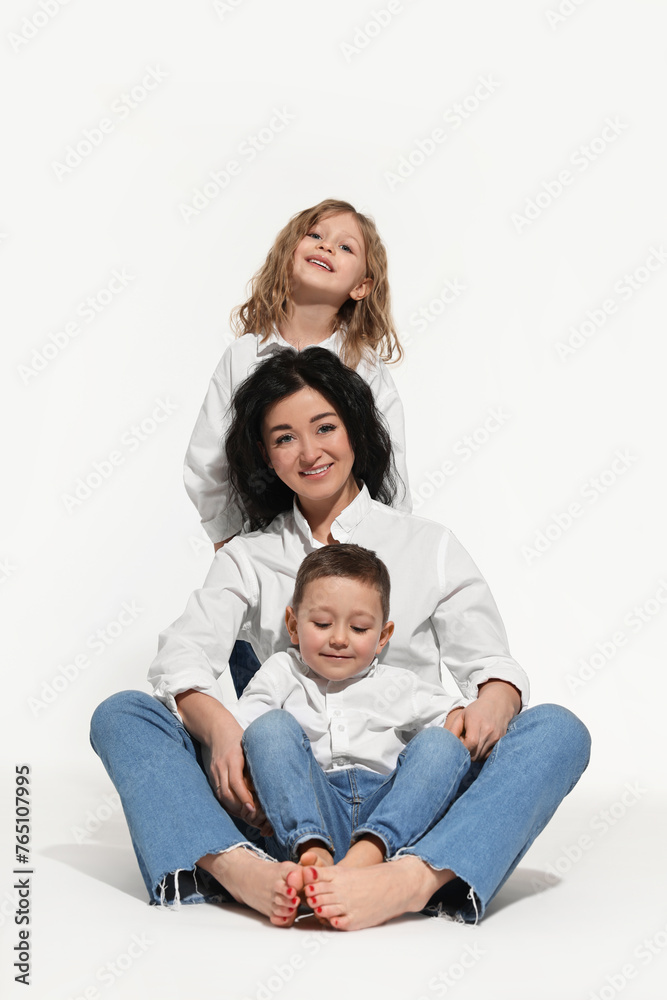 Little children with their mother on white background Little children with their mother on white background