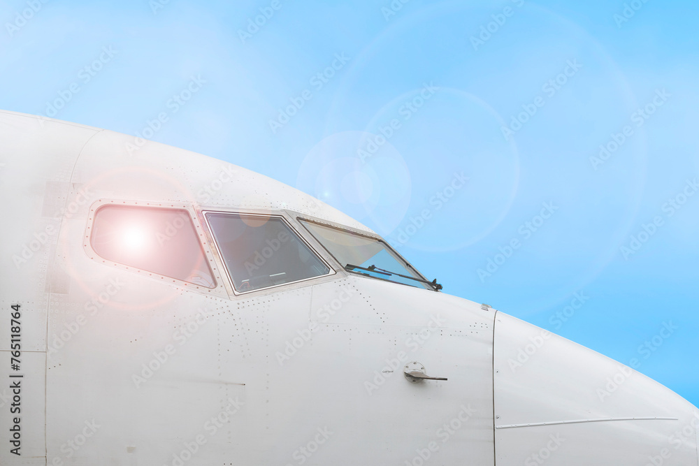 Front section with large commercial airline cockpit windows and sensors of the bodywork.