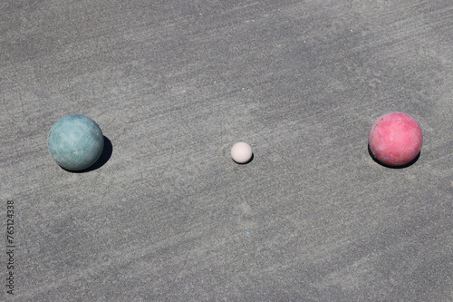 Bocce balls encircling the starting and scoring white ball.