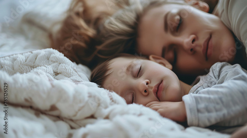 Mom with a small Child sleeping on a bed, white airy underwear, close-up,