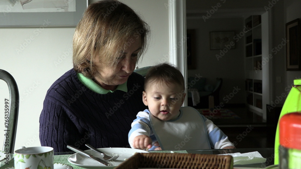 Baby toddler with grand-mother casual and authentic Baby toddler with grand-mother casual and authentic
