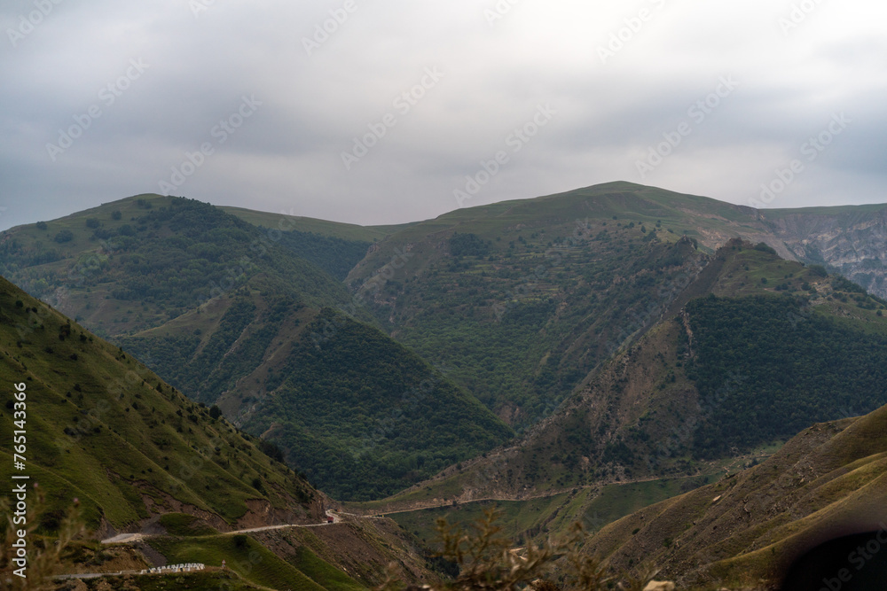 Caucasian mountain Dagestan. Trees, rocks, mountains, view of the green mountains. Beautiful summer landscape.