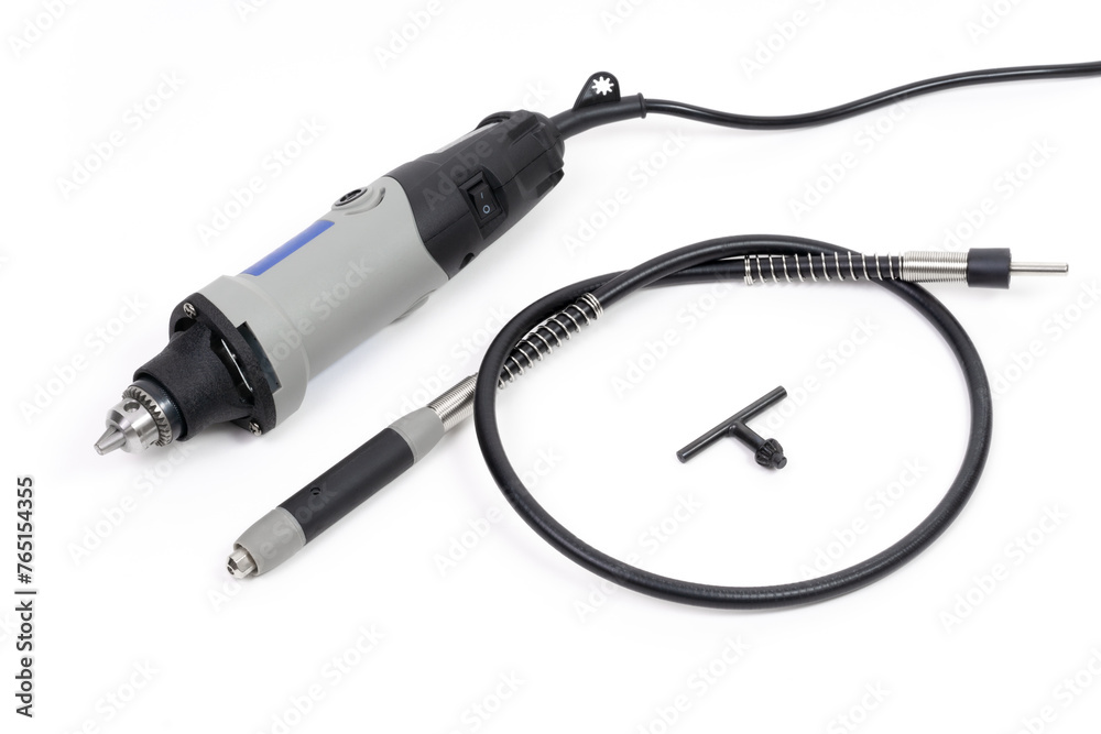 Mini Drill with Flexible Shaft and Chuck Key on White Mini Drill with Flexible Shaft and Chuck Key on White