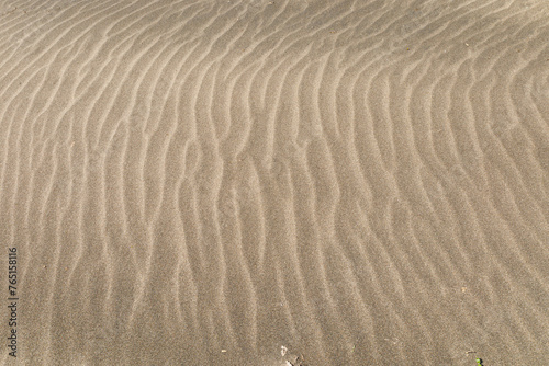 Ondas en la arena de la playa
