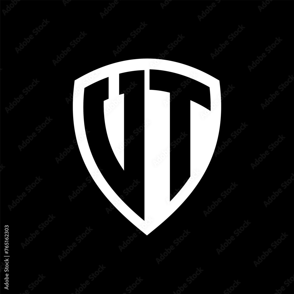 VT monogram logo with bold letters shield shape with black and white color design VT monogram logo with bold letters shield shape with black and white color design