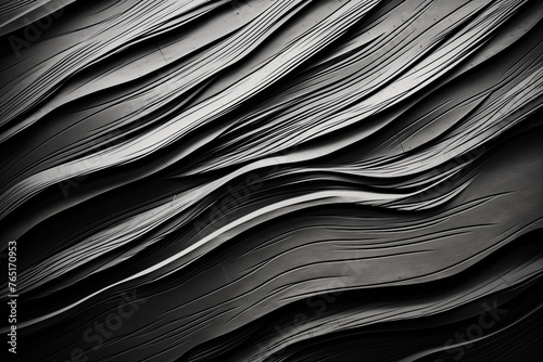 The image is a black and white photo of a wave