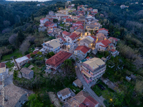 Fototapeta Naklejka Na Ścianę i Meble -  Aerial drone view of Antiperni village in north corfu, Greece by night