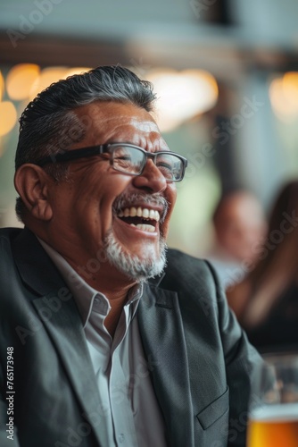 A man in a suit and glasses smiling. Suitable for business concepts