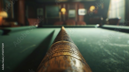 A pool table with a cue stick ready for a game. Suitable for sports and leisure concepts photo