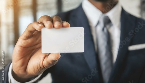 Businessman holding a Blank Business Card - Empty Business Card for Mockup - Template for Logo Design and Branding - Representation of Succesful Person