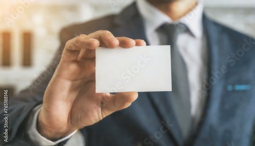 Businessman holding a Blank Business Card - Empty Business Card for Mockup - Template for Logo Design and Branding - Representation of Succesful Person