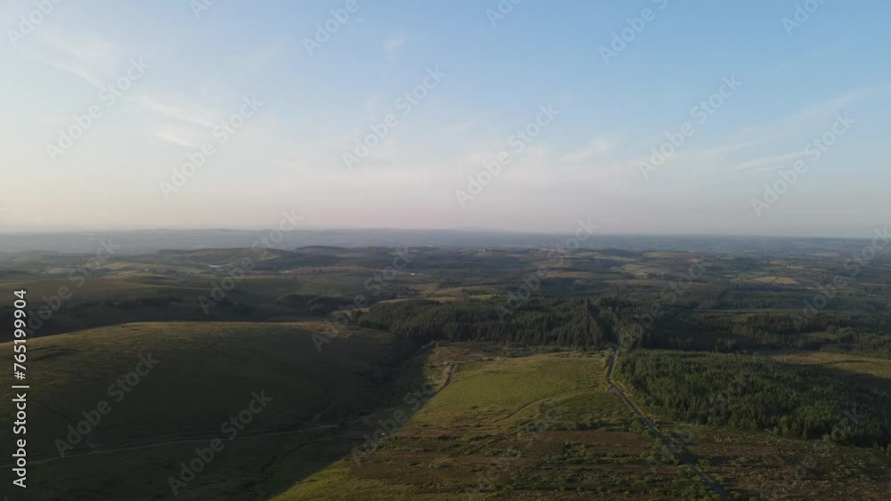A drone pan of the green mountains and drumlins at Bragan Mountains, Co. Monaghan, Ireland