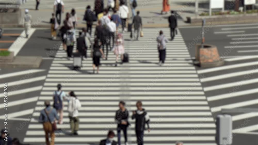 Elevated View of a Anonymous People Crossing Street Using Pedestrian Crosswalk in Japanese City Nagoya - Commercially Usable Elevated View of a Anonymous People Crossing Street Using Pedestrian Crosswalk in Japanese City Nagoya - Commercially Usable