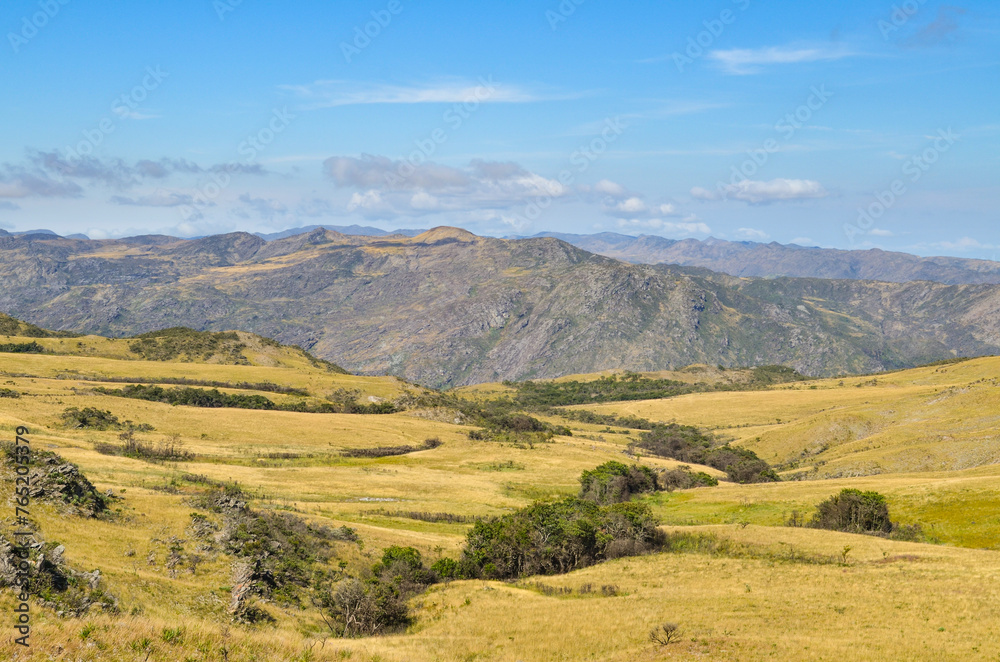 Naklejka premium Sunlight at dusk in the mountains of the Serra do Cipó region in Minas Gerais, Brazil