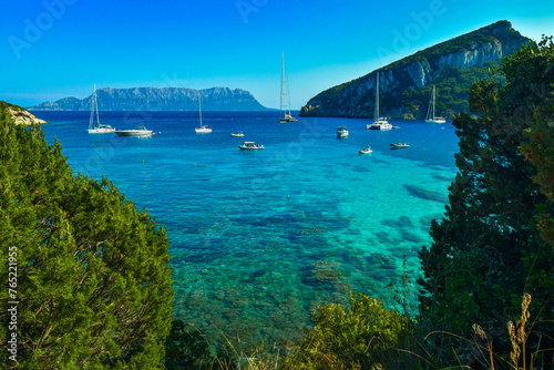 About 2 kilometers from the town of Golfo Aranci stands the small inlet of Cala Moresca, a charming small bay that extends within the protected area of the Capo Figari promontory, province of Olbia, S