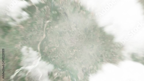 Earth zoom in from space to Montero, Bolivia. Followed by zoom out through clouds and atmosphere into space. Satellite view. Travel intro. Images from NASA photo