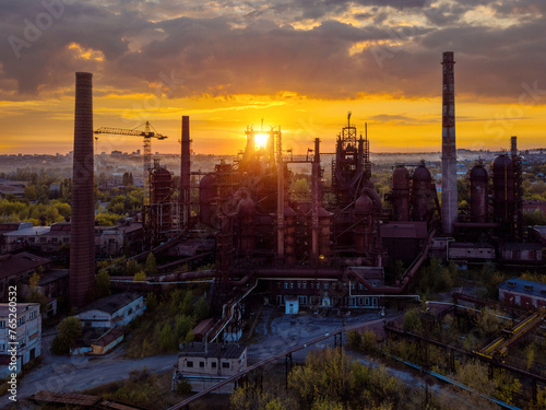 Blast furnace equipment of the metallurgical plant at the sunset  aerial view