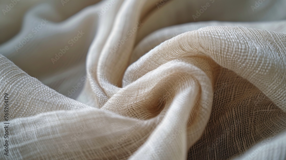 Gentle folds of a beige lightweight fabric, offering a sense of soft texture and organic flow