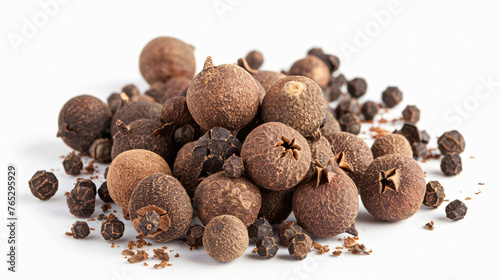 Heap of allspice berries isolated on a white background, focus on the texture and detail. 