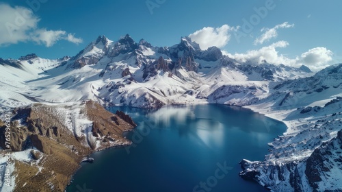 Aerial Panoramic View Of The Snowing Mountains Surrounding Laguna Del Inca In The Chilean Andes  Chile. 