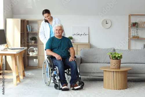 Senior man in wheelchair wi...