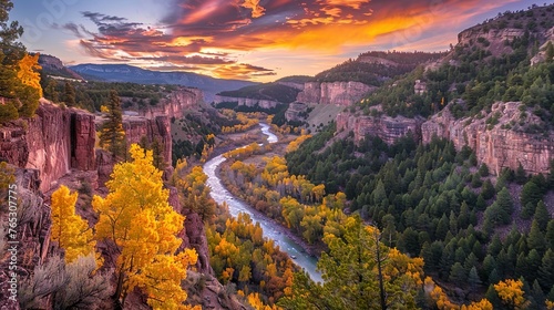 A canyon aglow with the fiery hues of autumn, as leaves change color on the trees photo