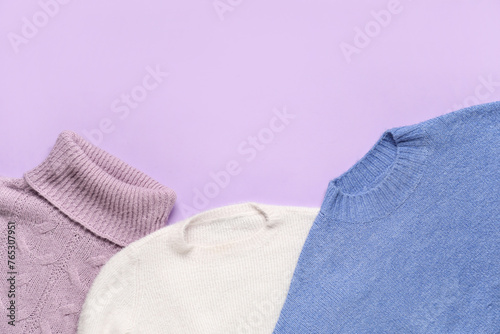 Set of warm female sweaters...