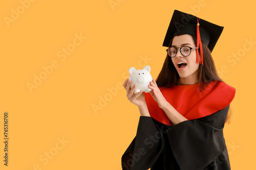 Shocked female graduate wit...