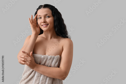 Young woman in towel after ...