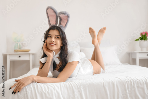Sexy young woman in bunny c...