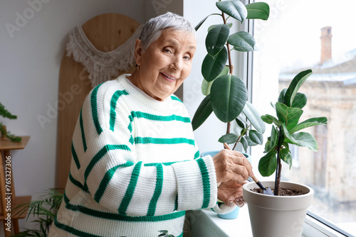 Smiling senior woman caring...