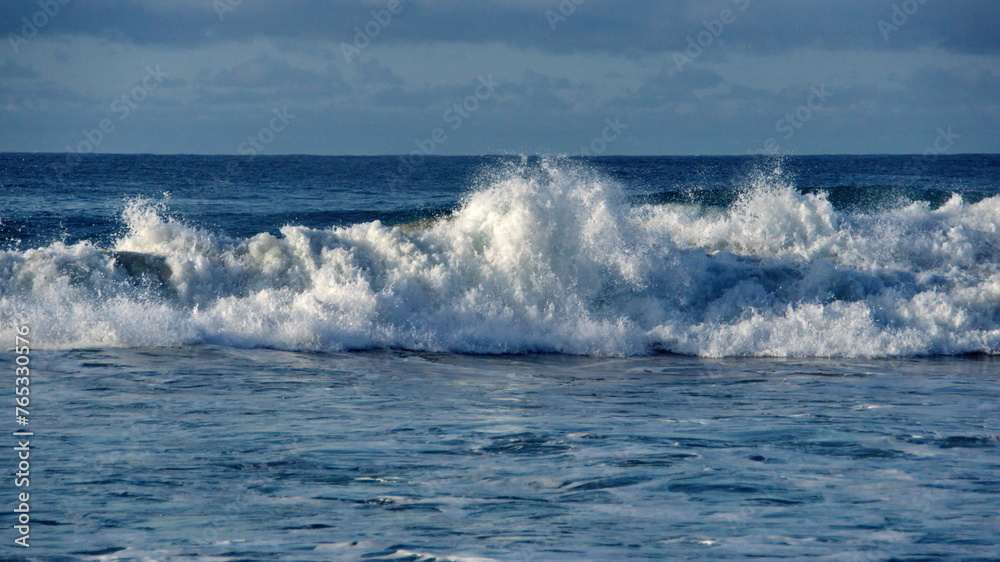 Waves breaking on the beach in Zipolite, Mexico