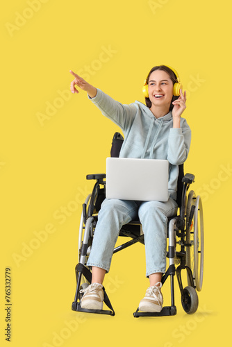 Young woman in wheelchair w...