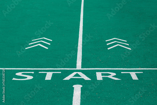 Running Track, Athletics Track Lane with the words start and forward arrow photo