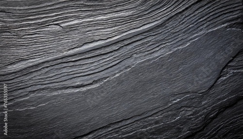 dark grey black slate stone background or texture