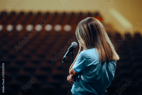 Sad Woman Not Ready to Speak in Public Rehearsing. Unhappy speaker feeling overwhelmed and stressed out 
 photo