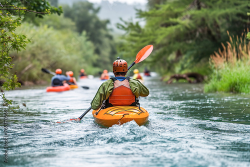 Outdoor enthusiasts engaging in water sports like kayaking and rafting. © Degimages