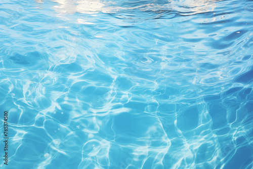 Alive with vibrant caustics as sunlight filters through the rippling waves on the water's surface of a swimming pool